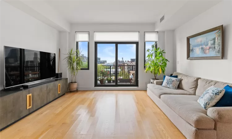 Living room featuring hardwood / wood-style floors