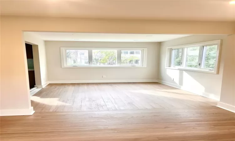 Spare room featuring light hardwood / wood-style floors