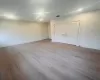 Second bedroom featuring light wood-type flooring