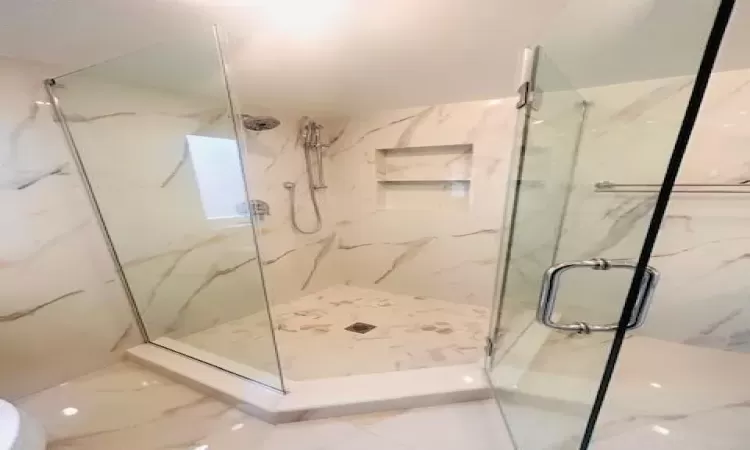 Bathroom featuring an enclosed shower