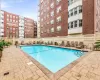 View of swimming pool featuring a patio area