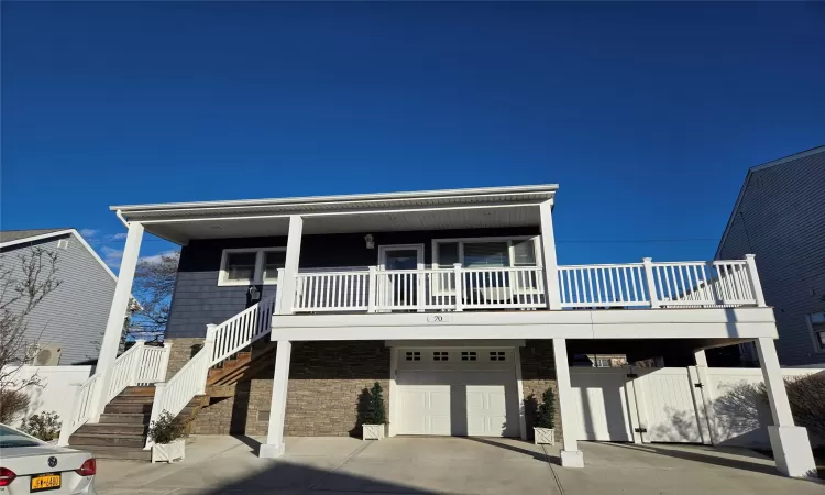 View of front of property with a garage