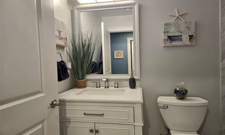 Bathroom with vanity and toilet