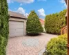 View of patio / terrace with a garage