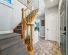 Stairs featuring ceiling fan