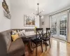 Dining space with breakfast area, hardwood / wood-style flooring, and french doors