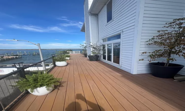 Deck featuring a water view