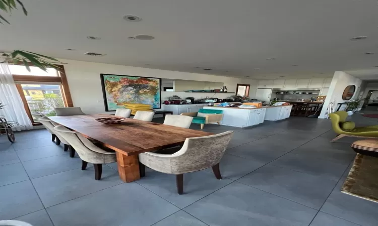 Dining area with tile patterned floors