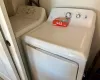 Laundry area with washing machine and clothes dryer