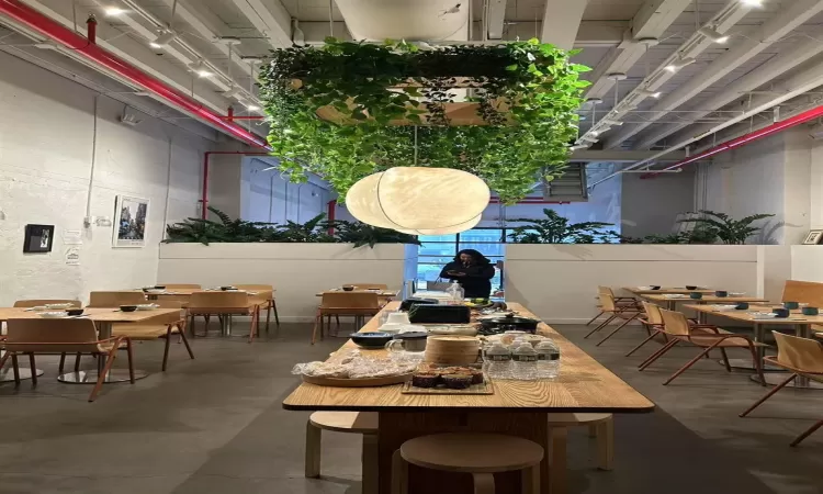 Dining room featuring concrete flooring