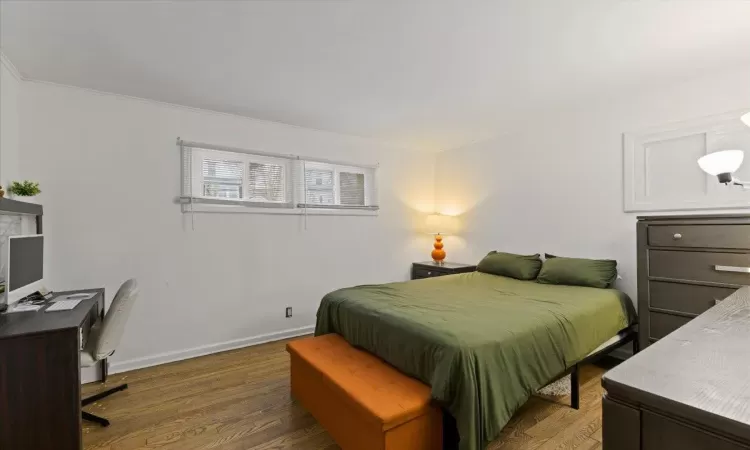 Bedroom featuring hardwood / wood-style flooring