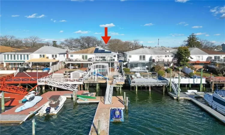 Dock area featuring a water view