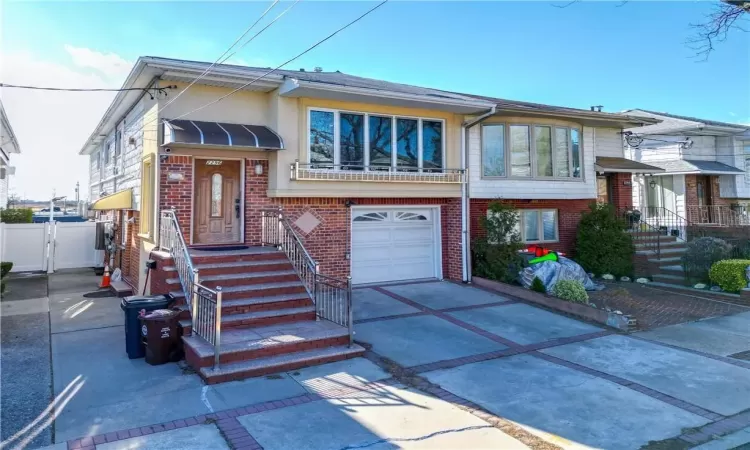 View of front of home with a garage