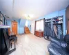 Living room with light hardwood / wood-style floors