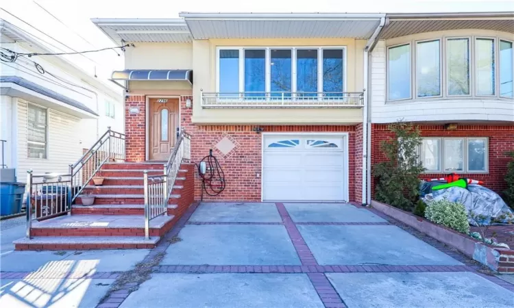 View of front of house with a garage