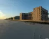 Outdoor building at dusk featuring a water view