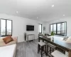 Dining area featuring plenty of natural light and light hardwood / wood-style floors