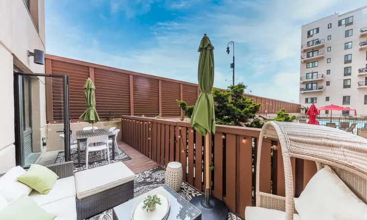 Wooden balcony featuring a wooden deck