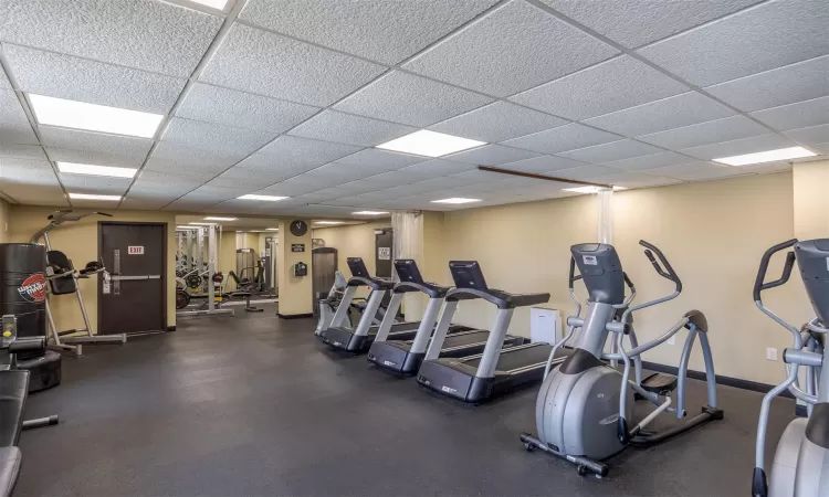 Exercise room with a paneled ceiling