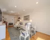 Living room with hardwood / wood-style flooring