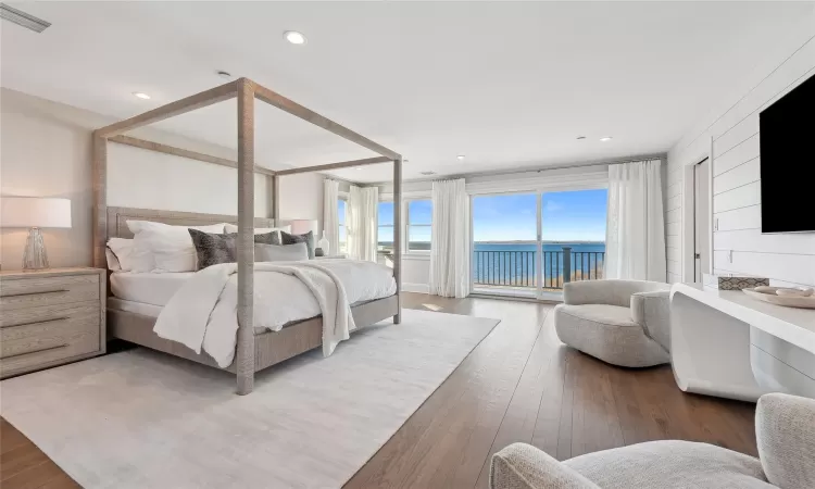 Bedroom featuring access to outside and wood-type flooring