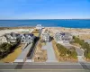 Aerial view featuring a water view and a residential view