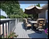 Wooden terrace featuring outdoor dining area