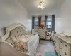 Bedroom featuring wood finished floors