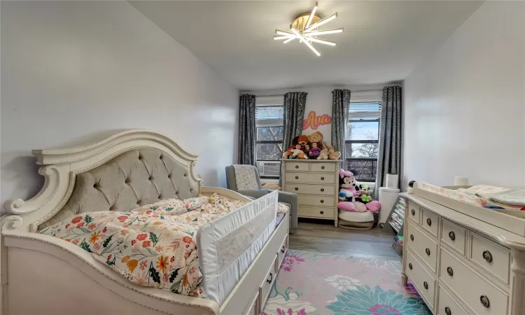 Bedroom featuring wood finished floors