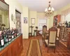 Wine cellar with a bar and a notable chandelier