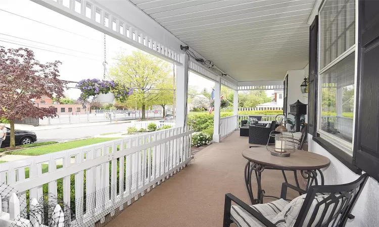 View of patio featuring covered porch