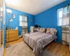 Bedroom with wood finished floors