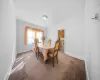 Dining room with ornamental molding and carpet flooring