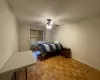 Bedroom featuring baseboards and a ceiling fan