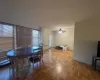 Dining area featuring radiator heating unit, baseboards, and a ceiling fan