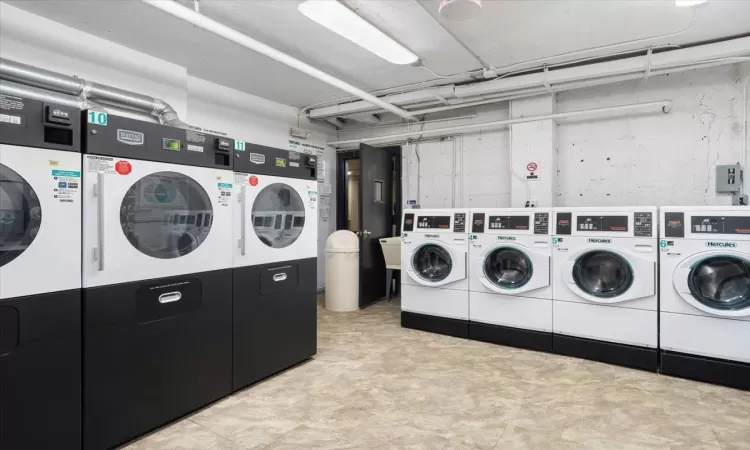 Common laundry area with separate washer and dryer