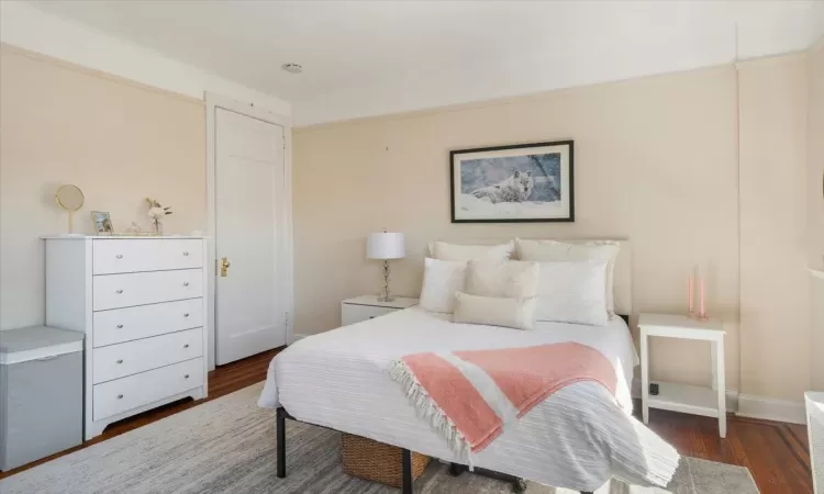 Bedroom featuring wood finished floors