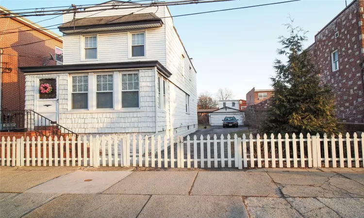 View of front of house with a fenced front yard