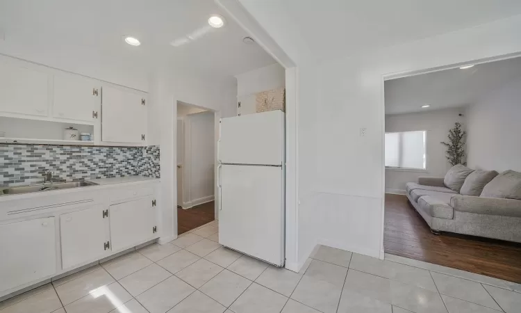 Clothes washing area with independent washer and dryer and cabinet space