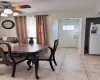 Dining room featuring a healthy amount of sunlight and light tile patterned floors