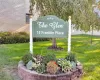 Community sign with a lawn