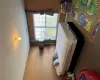 Carpeted bedroom featuring visible vents and baseboards