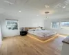 Bedroom with visible vents, wood ceiling, light wood-style flooring, and recessed lighting