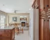 Living room with light carpet and crown molding