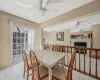 Bedroom featuring ceiling fan, visible vents, baseboards, and light colored carpet