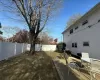 View of yard featuring a fenced backyard and a wooden deck