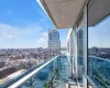 Balcony featuring a view of city