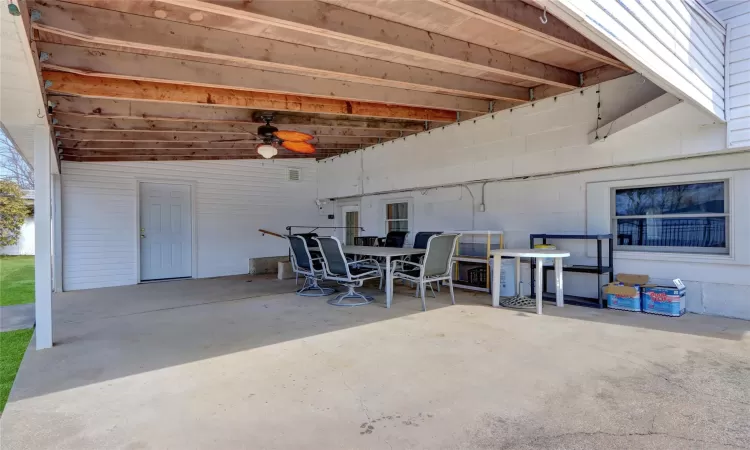 View of patio / terrace featuring outdoor dining area and a ceiling fan