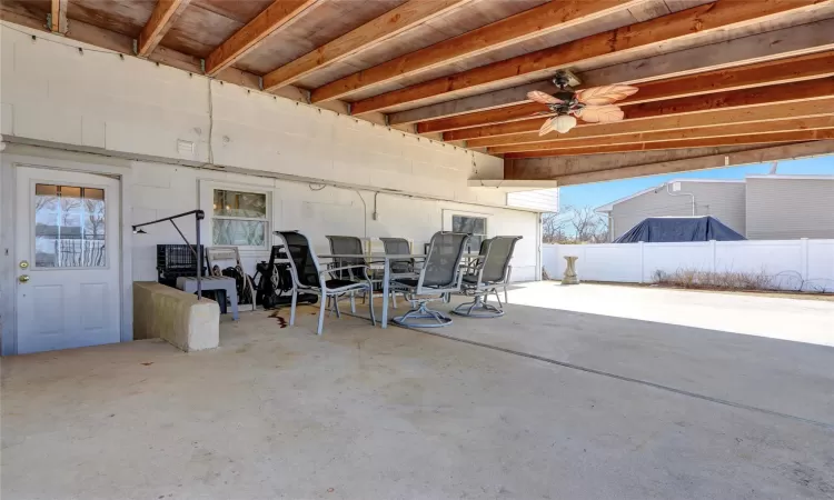 View of patio / terrace featuring outdoor dining area and fence