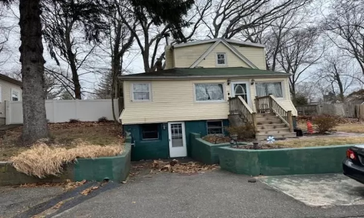 View of front of house with fence